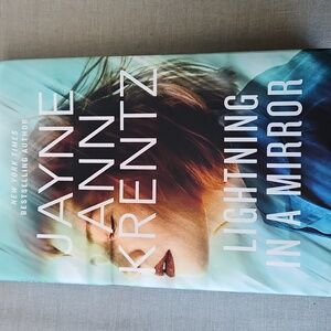 Lightning in a Mirror Hardcover Book